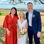 Angela with Amy and Murray under the trees on their wedding day.